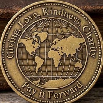The Your Ripple Coin Effect: the world in relief, with Giving, Love, Kindness, Charity around the rim and Pay it Forward beneath it